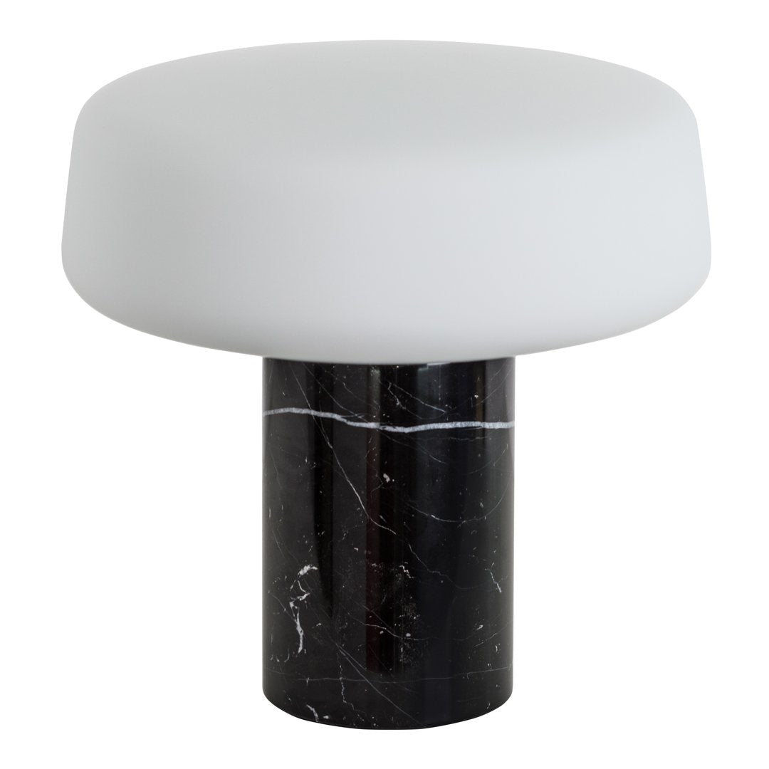 Round white glass lamp with a black marble base, featuring a smooth, modern design. Perfect for contemporary decor.