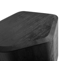 Black wooden surface with a smooth, matte finish and subtle grain patterns. Elegant and modern design.