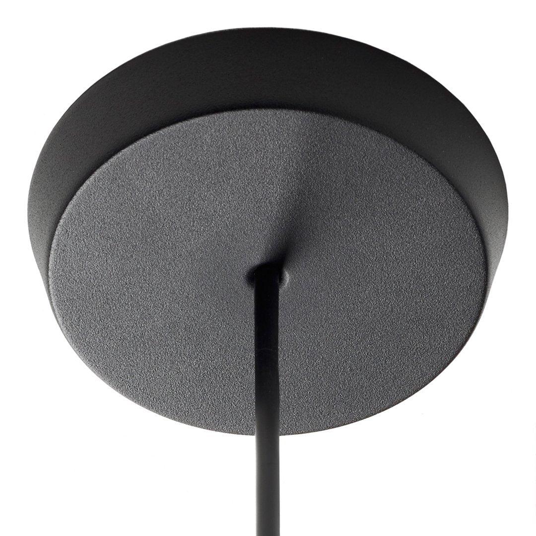 Black ceiling mount with a smooth, matte finish, featuring a minimalist round design and sleek hanging cord.