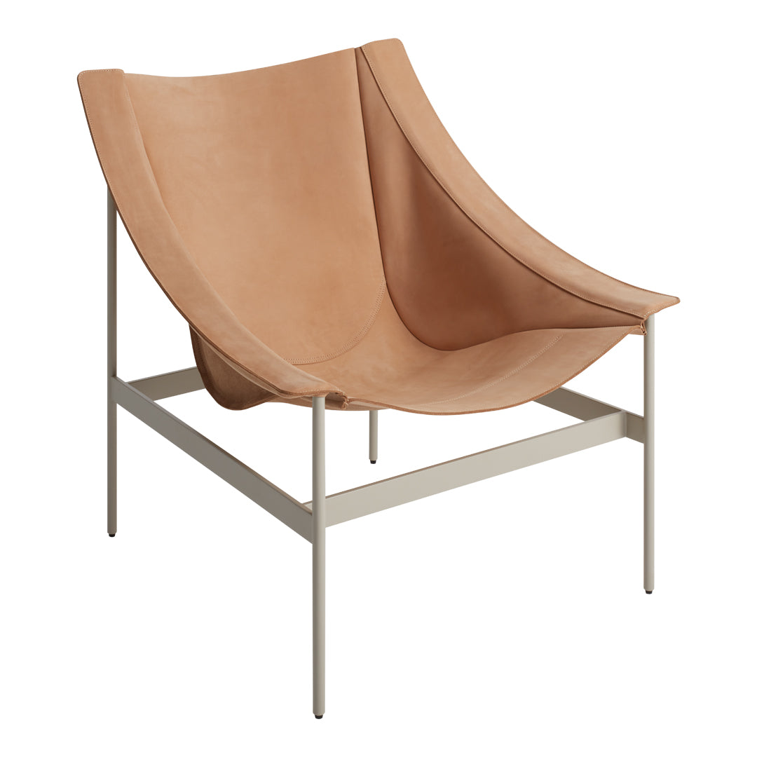 Tan leather chair with smooth, minimalist contours and a light beige metal frame. Stylish and modern design.