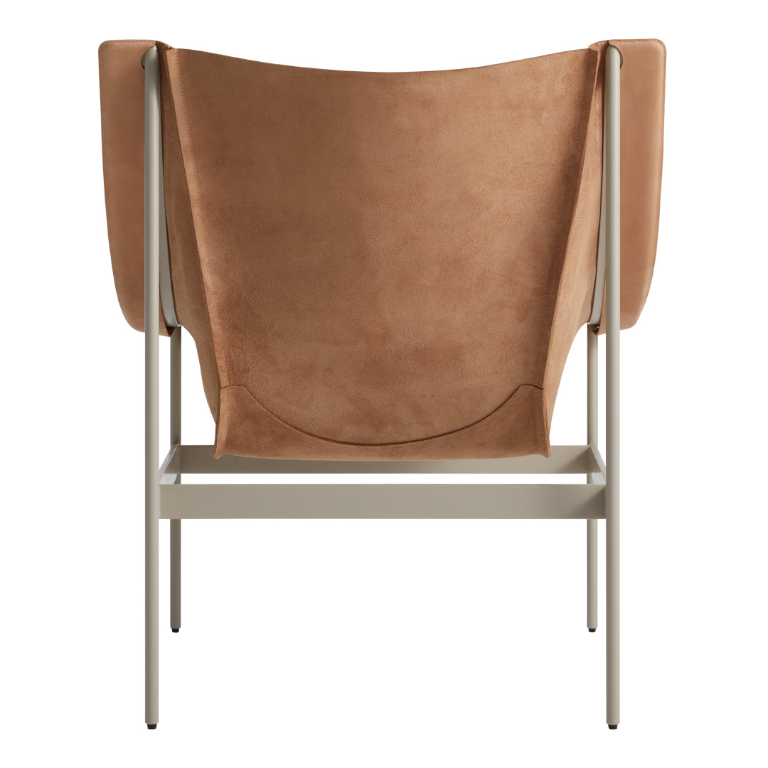 Tan suede chair with a minimalist metal frame, featuring smooth, clean lines and a contemporary design.