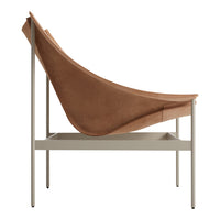 Stylish brown suede lounge chair with a sleek light gray metal frame, featuring a smooth, minimalist design.