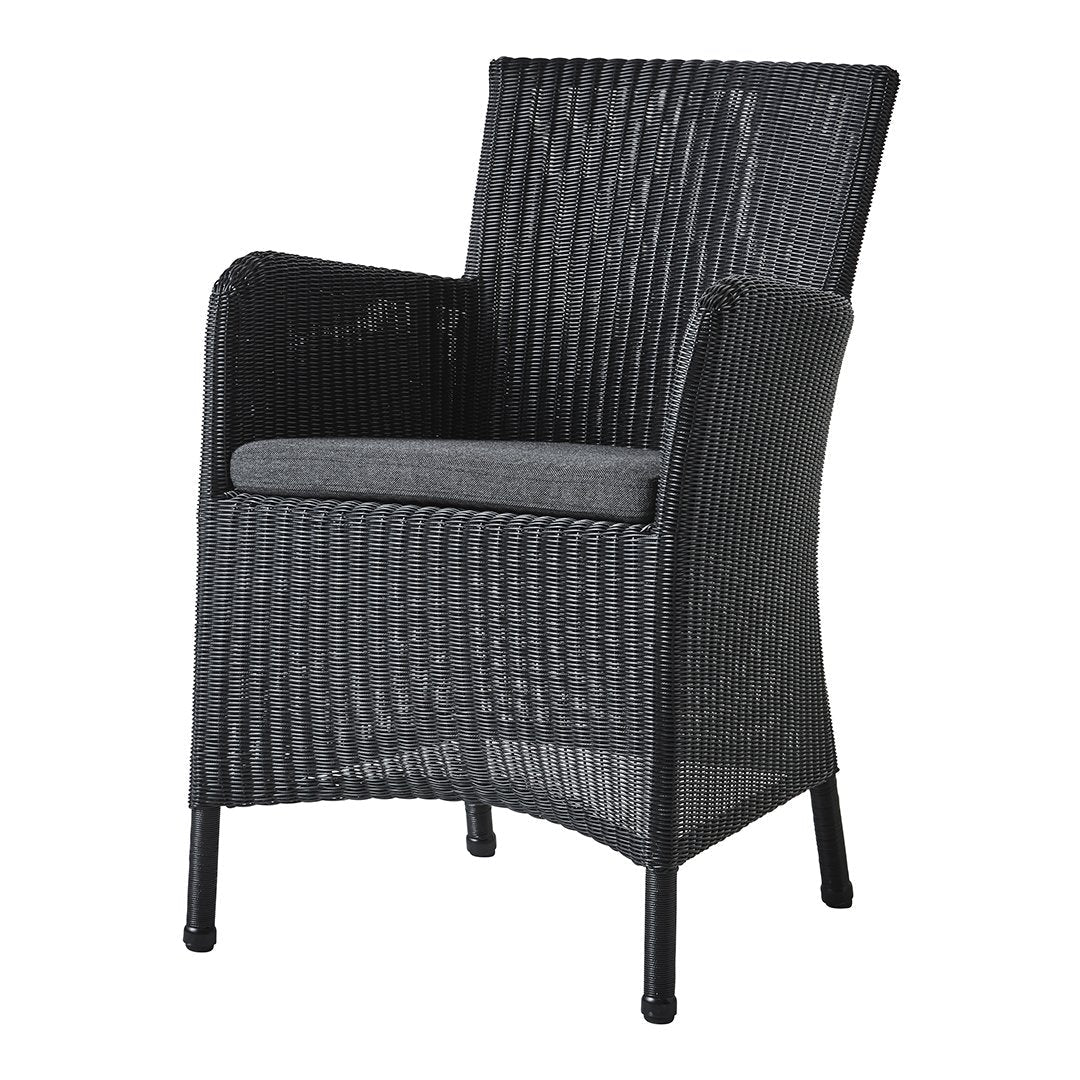 Black wicker armchair with a gray cushioned seat, featuring vertical textured patterns. Ideal for outdoor settings.