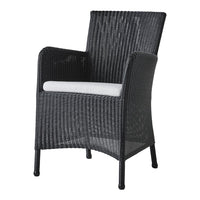 Black woven chair with a sleek texture and a light gray cushion for added comfort. Ideal for modern decor.