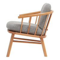 Mid-century chair with light wood frame and textured gray upholstery featuring a subtle pattern.