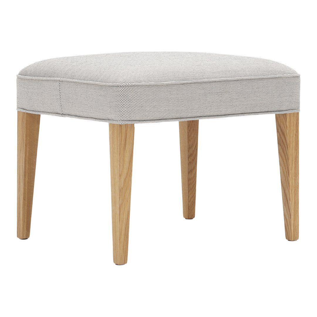 Light gray upholstered ottoman with natural wood legs, featuring a minimalist design and smooth, rounded edges.