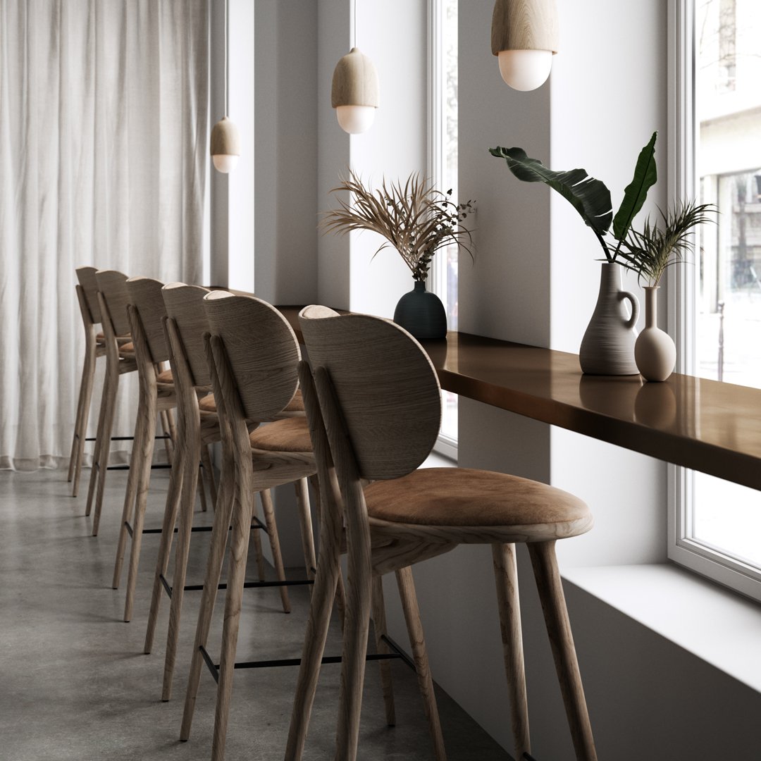 Minimalist wooden chairs in soft natural tones, paired with neutral gray and white accents, creating a serene, modern vibe.