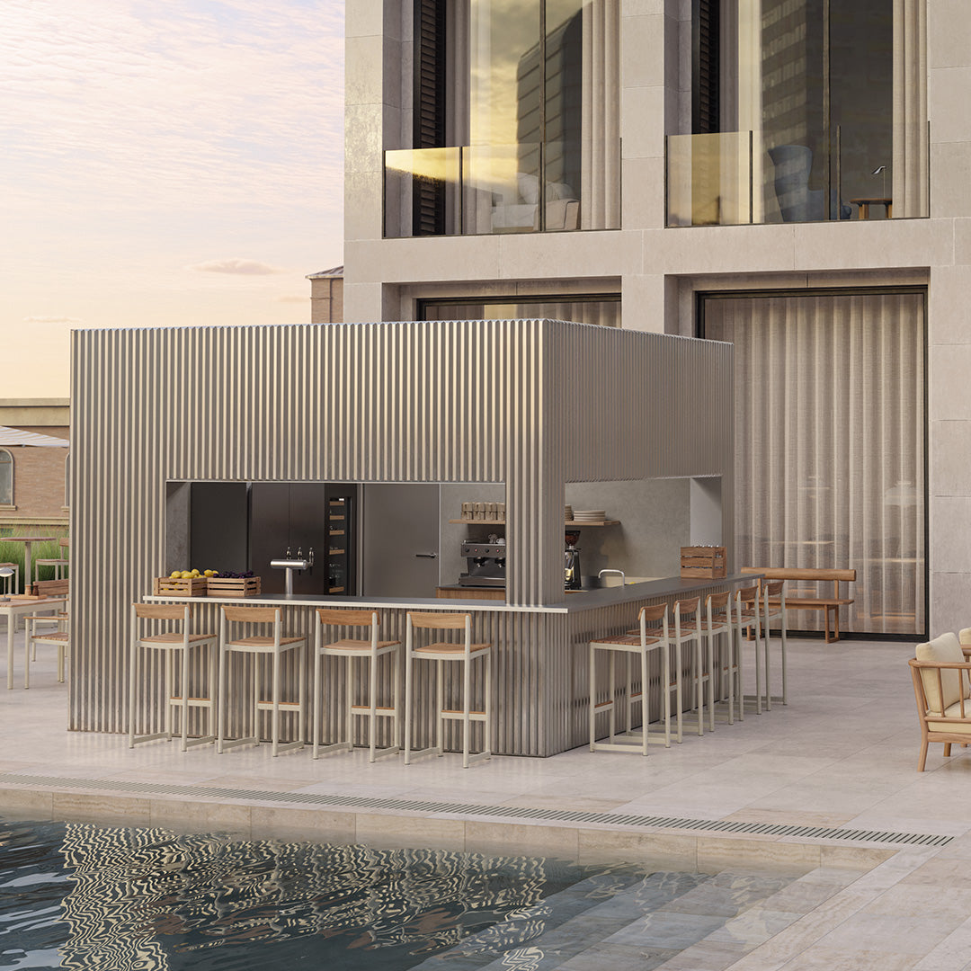 Modern outdoor kitchen with sleek metallic silver finish and wooden accents, featuring a minimalist ribbed pattern.