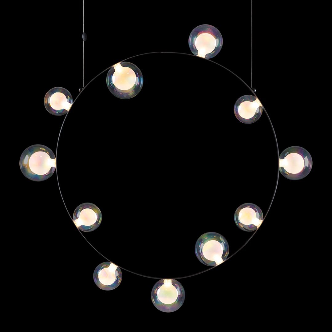 Circular pendant light featuring clear glass bulbs on a sleek black frame with a modern minimalist design.