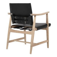 Black leather chair with wooden frame and unique buckle detail on the back. Modern design features clean lines.