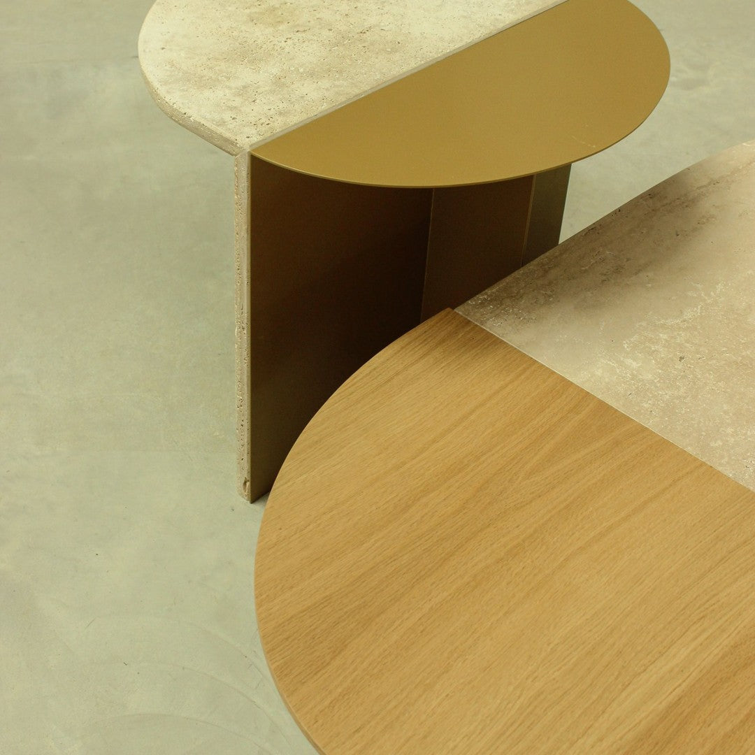 Modern side tables with a beige marble top and mustard yellow accent, featuring a smooth wooden finish.