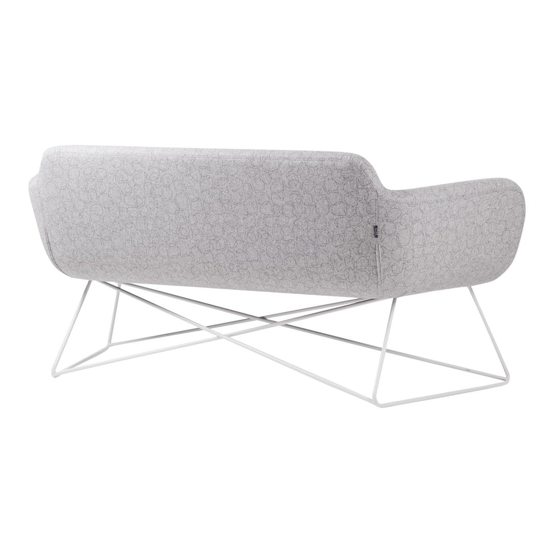 Elegant gray patterned sofa with a modern white metal frame, perfect for contemporary interiors.