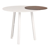Round white table with a contrasting dark wood accent, featuring clean lines and a modern design.