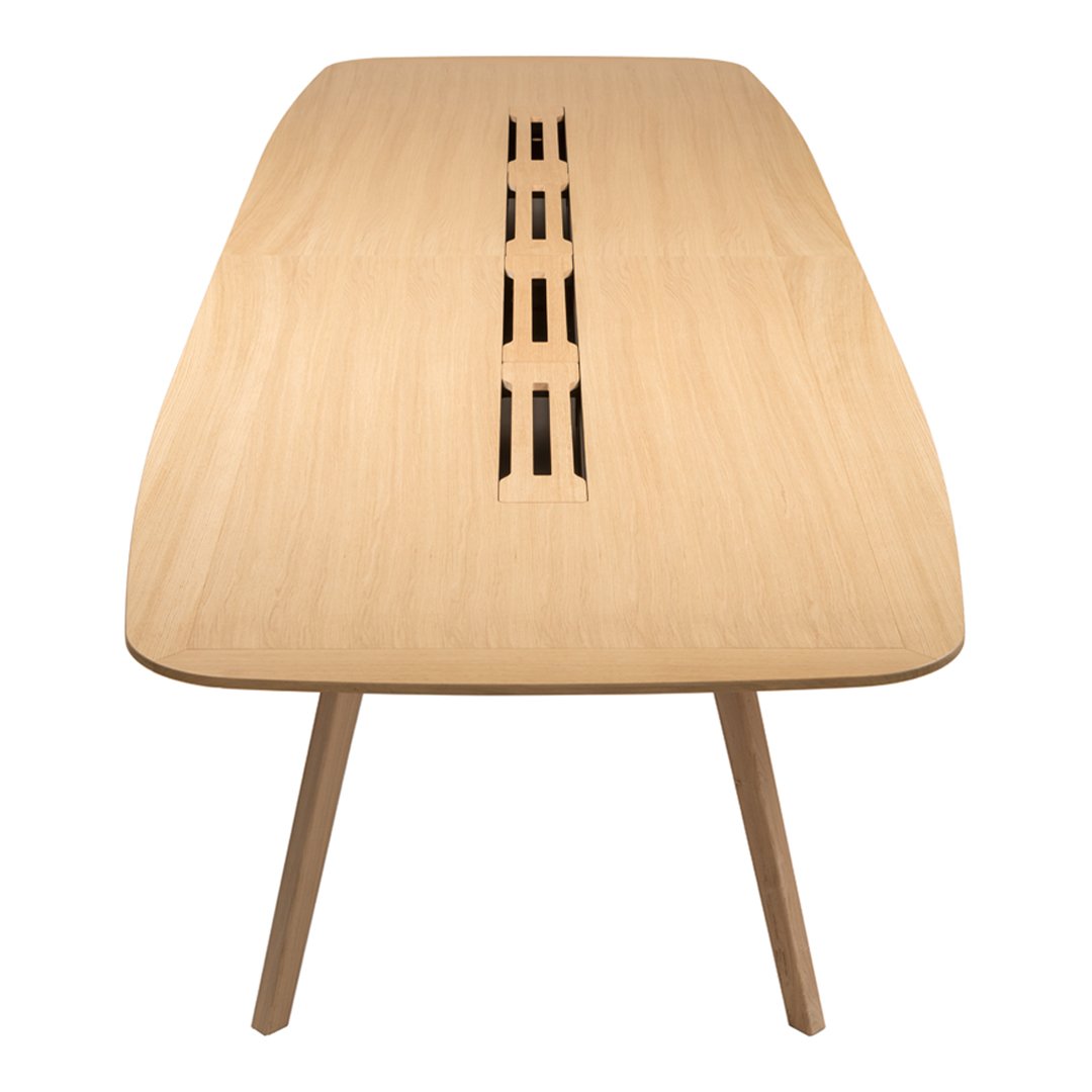Natural wood dining table with a smooth finish and sleek, tapered legs, featuring a stylish slotted design.