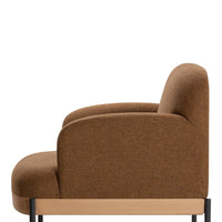 Brown upholstered chair with a smooth, curved design and minimalist black metal legs.
