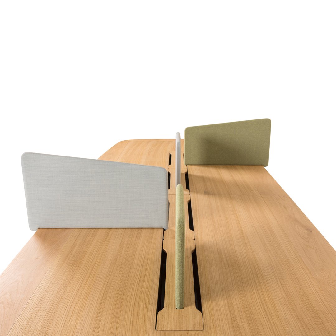 Light wood desk with a smooth finish, featuring gray and green acoustic panels and a sleek, minimalist design.