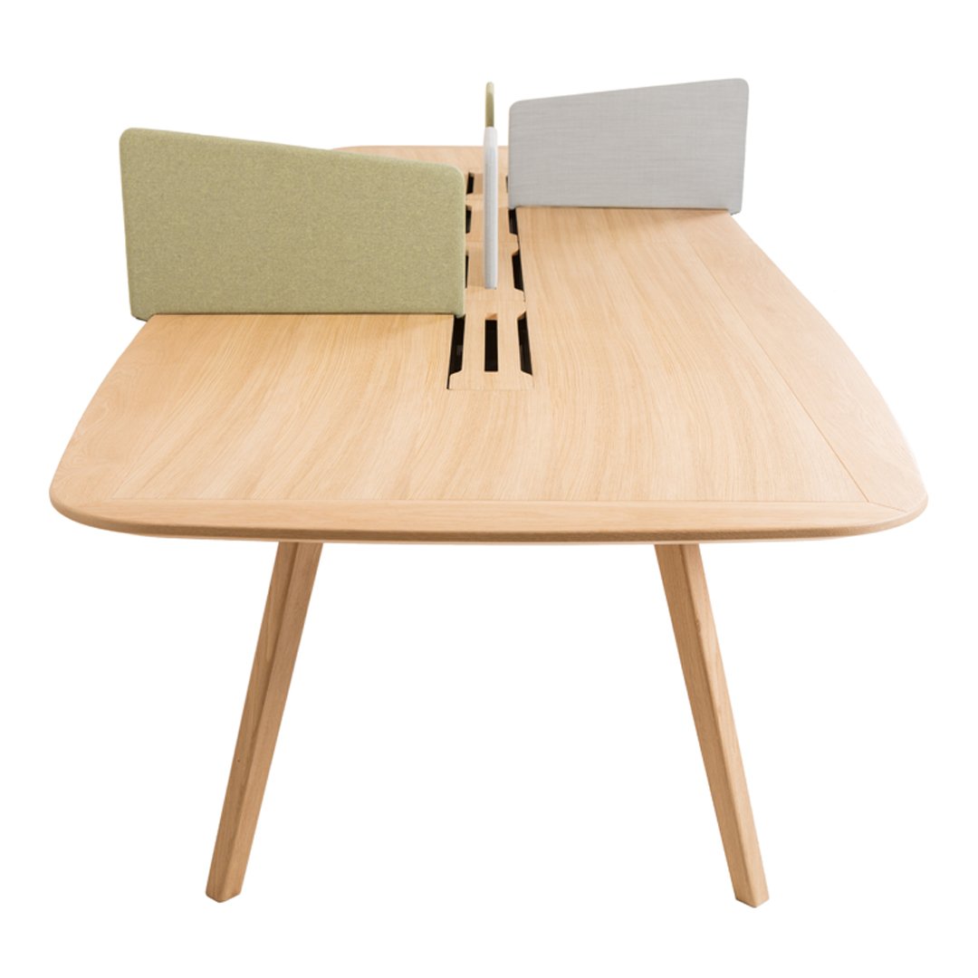 Light wood table with a smooth finish, featuring green and gray acoustic panels for a modern, minimalist look.