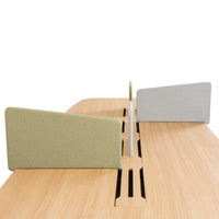 "Wooden desk with pale green and light gray acoustic panels, minimalistic design, clean lines, and natural finish."