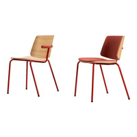 Two modern chairs featuring natural wood finishes with red metal legs and contrasting red seat cushions.