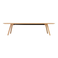 Light wood dining table with a smooth, simple design and natural finish, featuring tapered legs and a minimalist aesthetic.