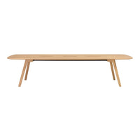 Natural wood grain dining table with a smooth, light-colored finish and minimalistic design. Perfect for modern interiors.