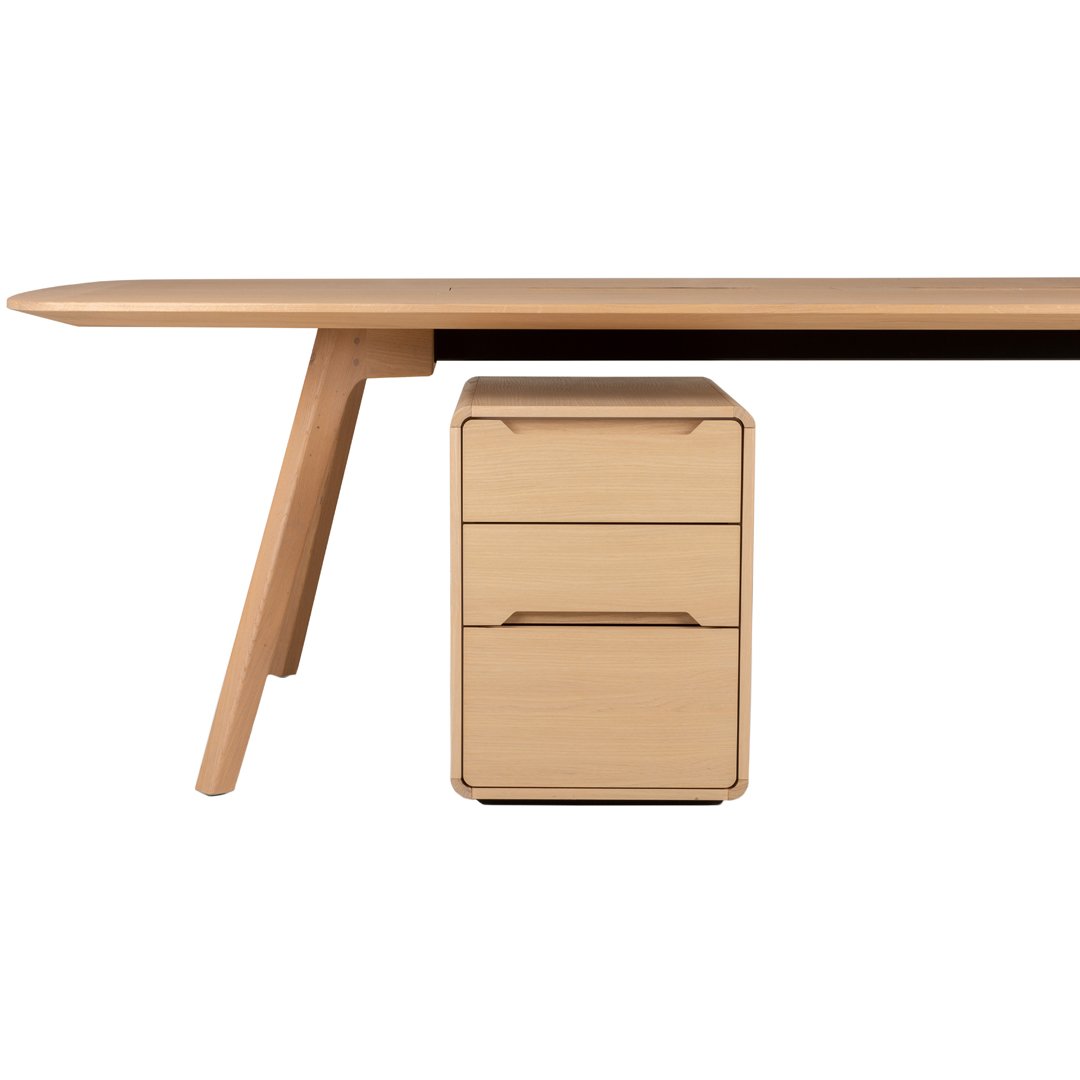 Light wood desk with a sleek, minimalist design. Natural grain pattern and neutral tones for a modern aesthetic.