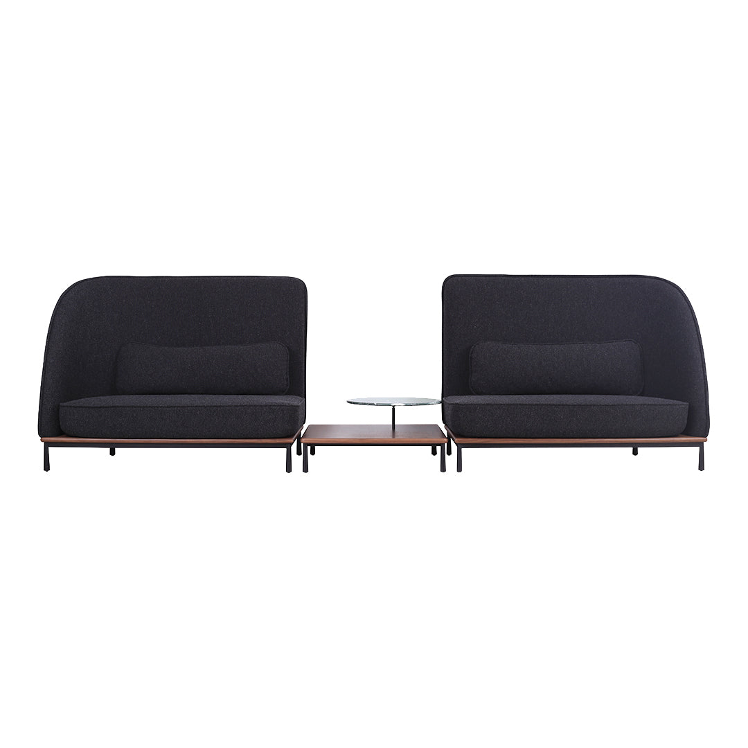 Modern black sofa set with sleek curved lines and wooden accents, featuring a minimalist design perfect for any decor.