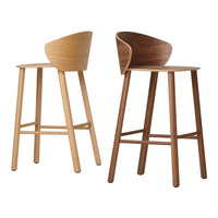 "Light wood and dark wood bar stools with curved backs, showcasing natural textures for modern decor."