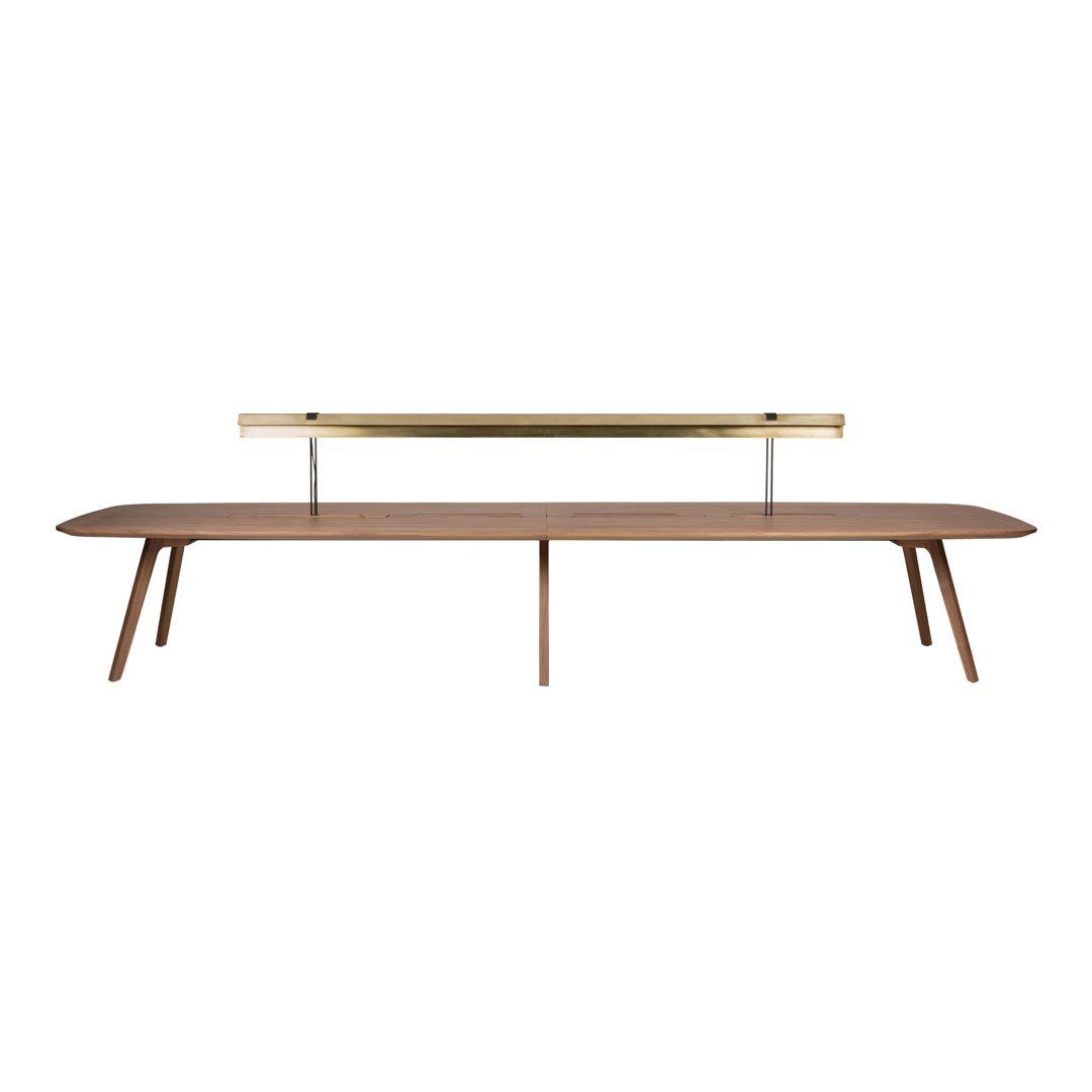 Modern walnut coffee table with sleek brass accents and minimalistic design, featuring a smooth, polished finish.