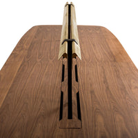Natural walnut wood tabletop with sleek black accents and a contrasting cream-colored detail. Elegant, modern design.