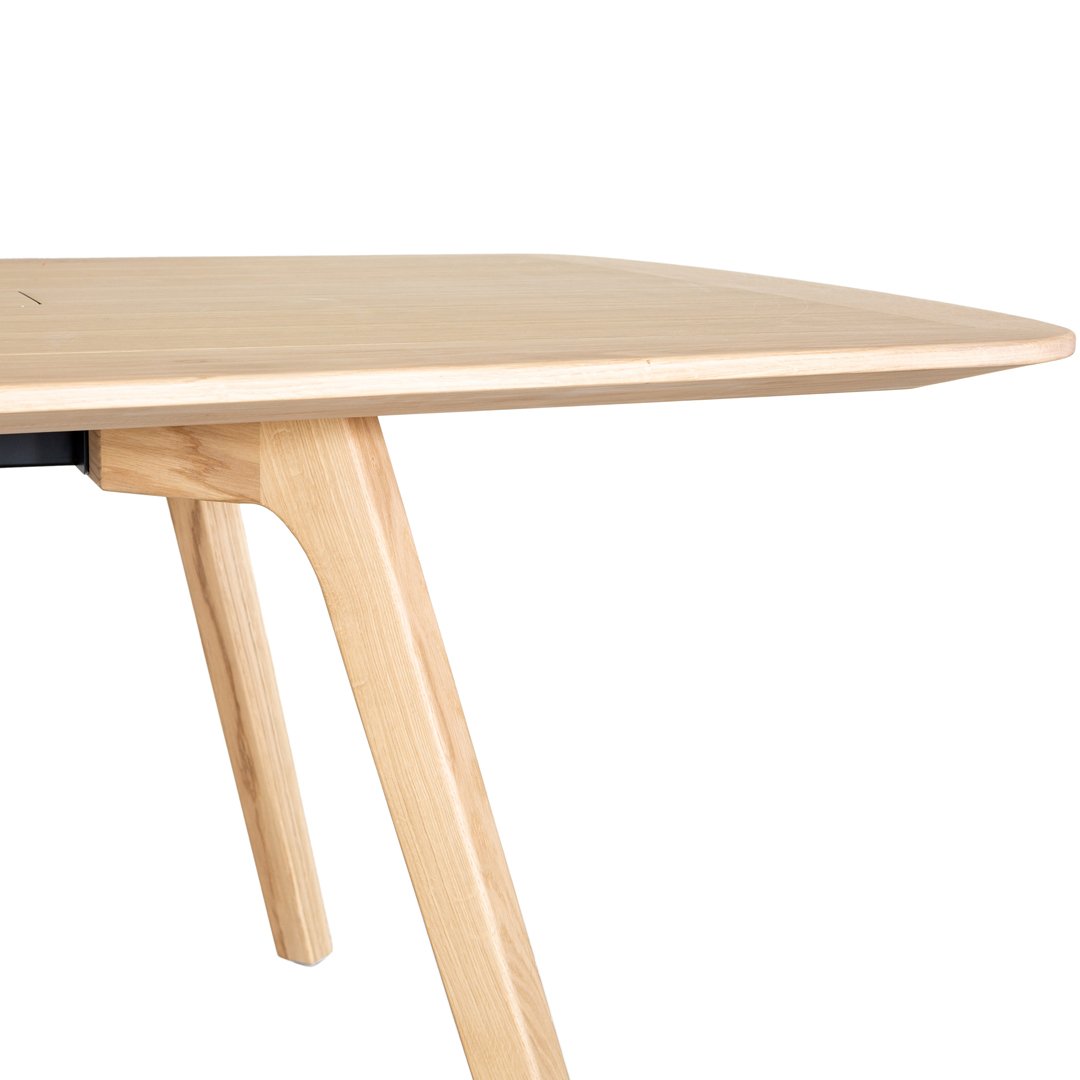 Natural wood table with a smooth, light beige finish and sleek, minimalist design. Perfect for modern interiors.