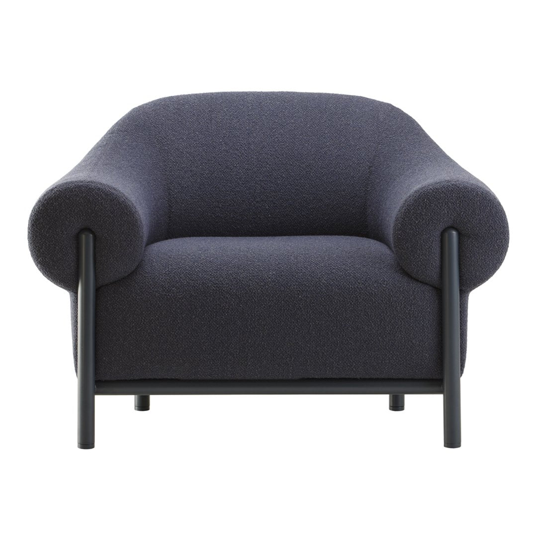 Navy blue textured upholstered armchair with rounded arms and black metal frame, perfect for modern decor.