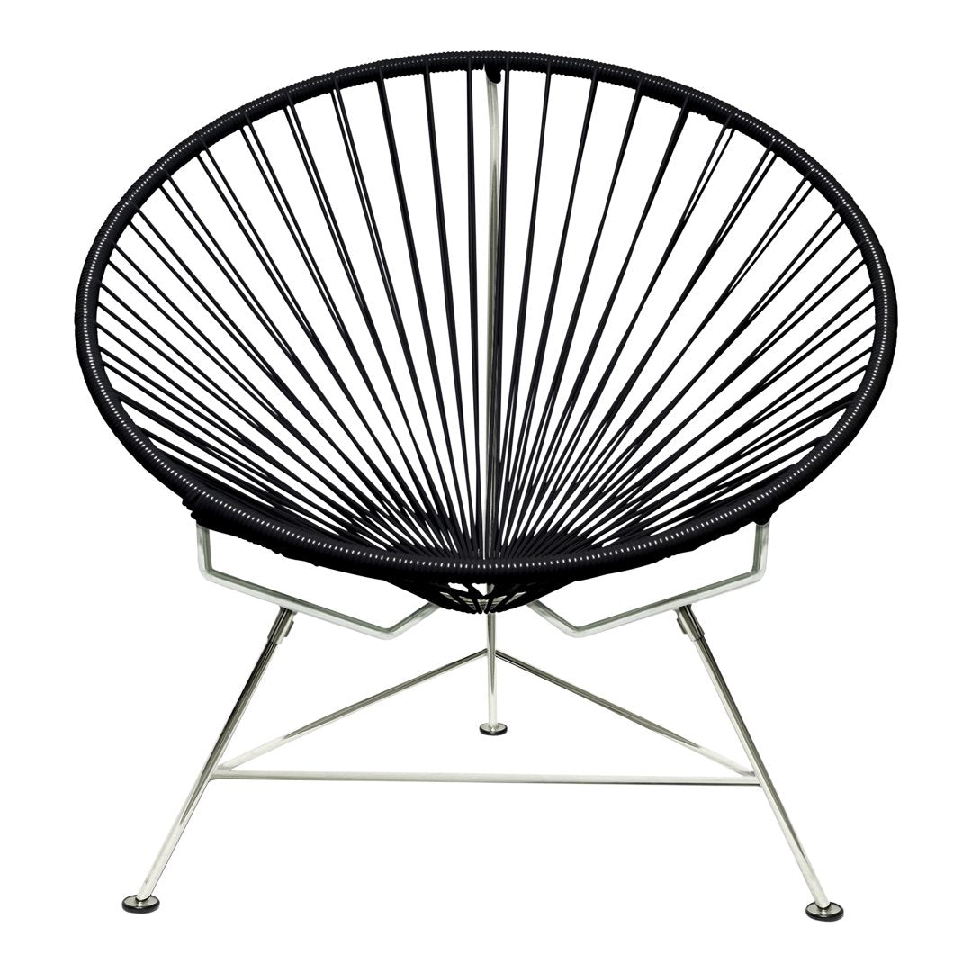 Black wire chair with a circular, radiating pattern on a sleek silver frame. Modern design for stylish interiors.