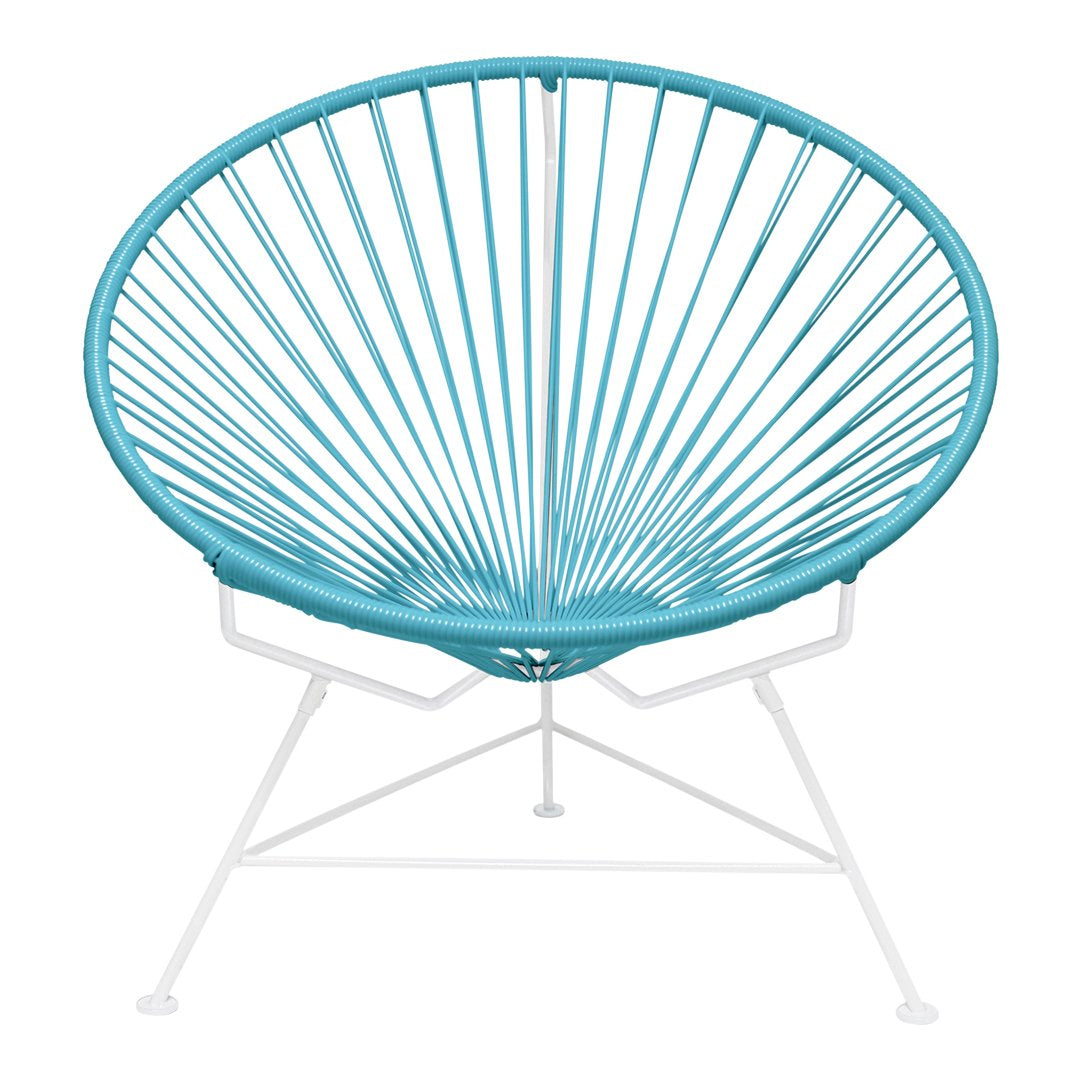 Turquoise round chair with a radial pattern and white metal frame, perfect for modern outdoor or indoor decor.