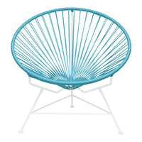 Turquoise round chair with a radial pattern and white metal frame, perfect for modern outdoor or indoor decor.
