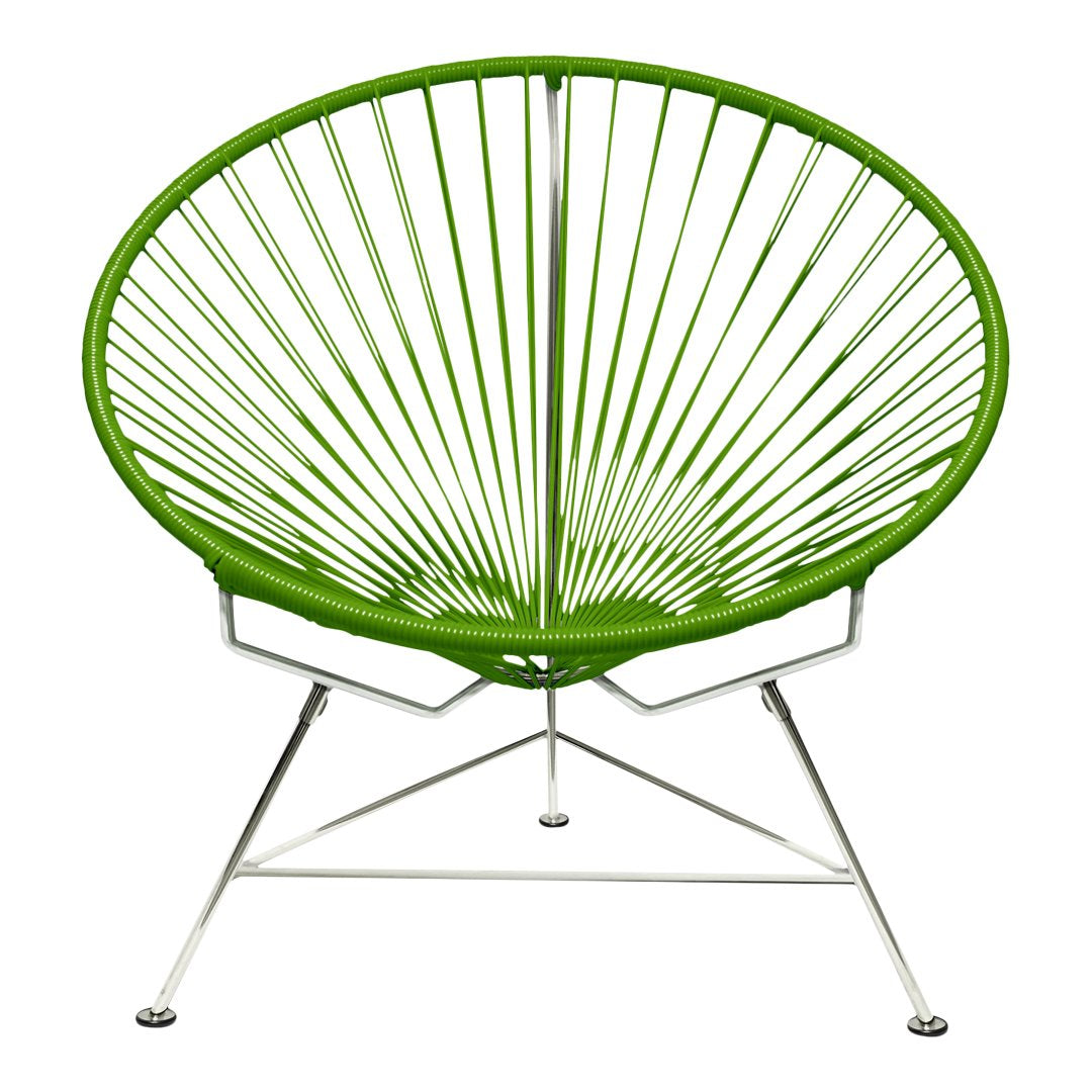 Vibrant green Acapulco chair with radial pattern and sleek silver legs, perfect for modern decor.