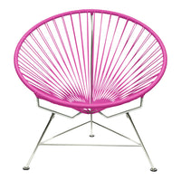 Vibrant pink circular chair with sleek silver legs and a modern design, featuring a unique radial pattern.