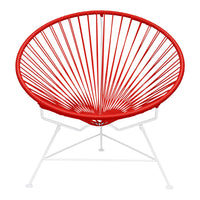 Vibrant red circular chair with linear pattern and sleek white metal legs. Perfect for modern outdoor decor.