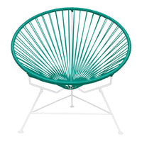 Teal circular chair with a sunburst pattern and white metal legs, perfect for modern outdoor or indoor decor.