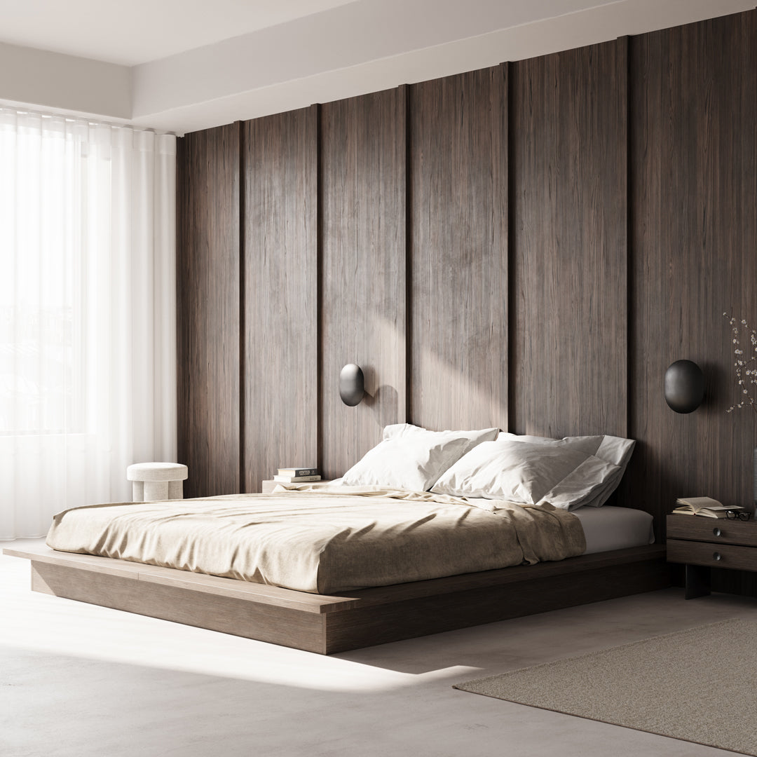 "Modern bedroom featuring warm beige bedding and dark wooden paneling with soft natural light filtering through sheer curtains."