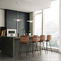 Brown wooden bar stools on black and gray stone kitchen island in modern, minimalist kitchen setting.