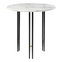 Round marble tabletop in white with gray veining, supported by sleek black legs featuring gold accents.