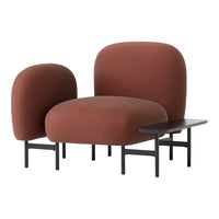 Modern brown chair set with soft, rounded shapes and black metal legs, featuring a minimalist design.