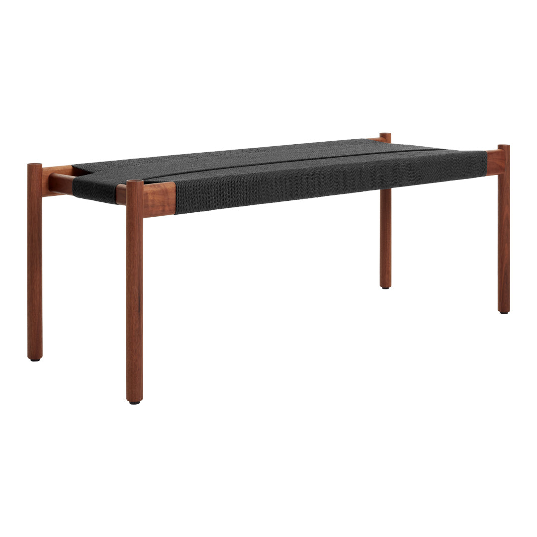 Modern wooden bench with a dark gray cushion and rich brown legs, featuring a sleek, minimalist design.