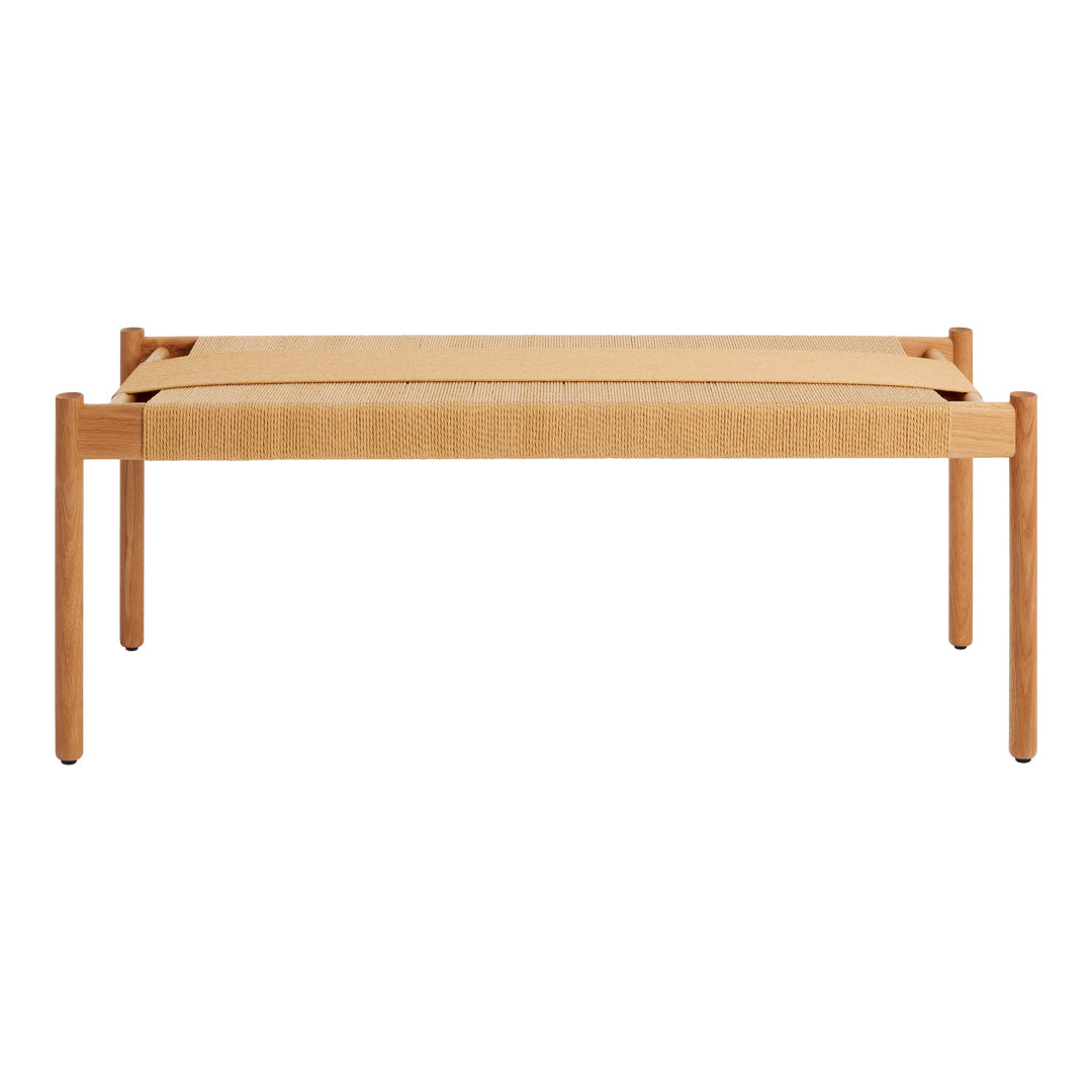 Natural wood bench with light tan fabric seating, showcasing minimalist design and clean lines. Perfect for modern decor.