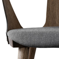Gray textured fabric seat with natural wood accents, showcasing a modern and minimalistic design.