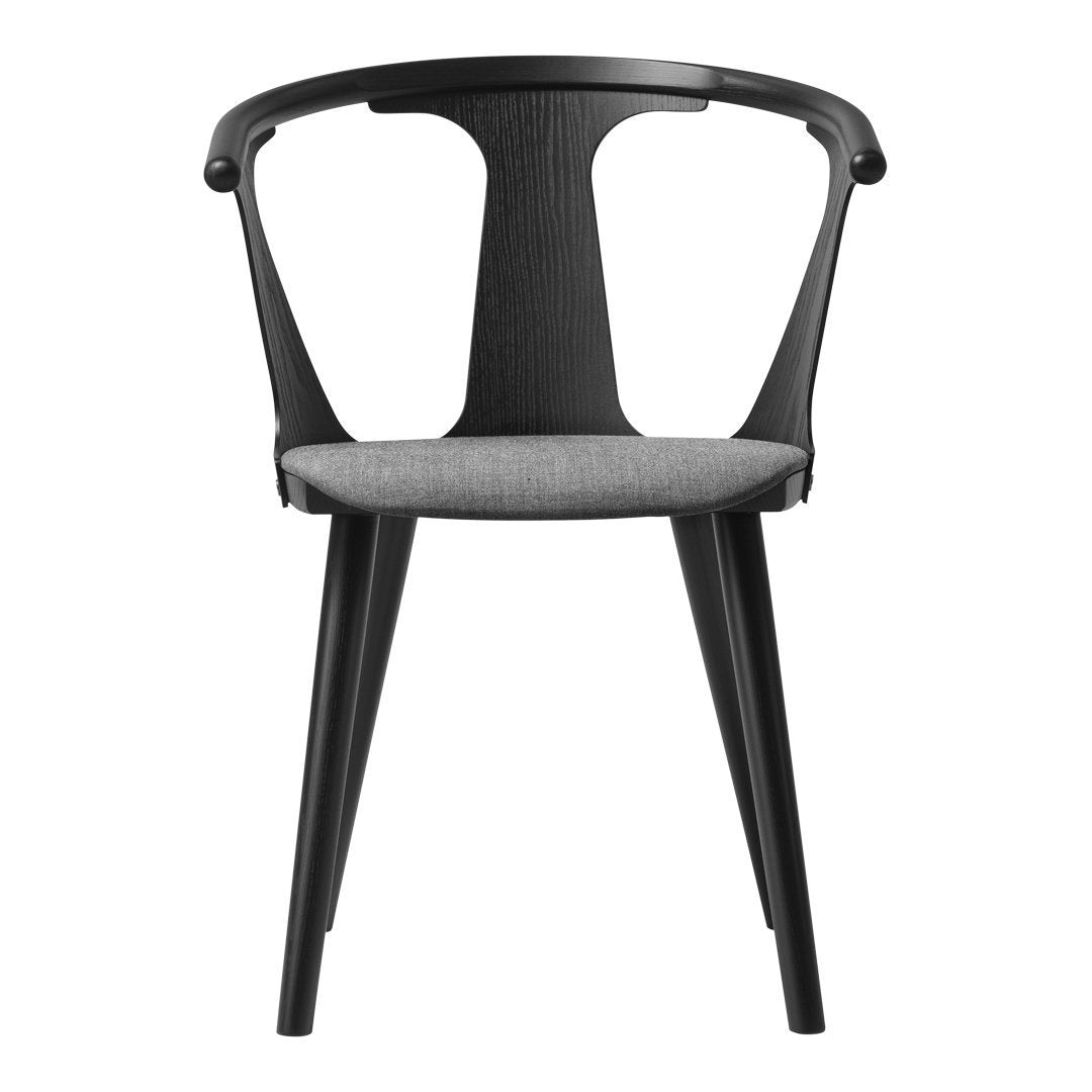 Black modern chair with a sleek design and gray upholstered cushion for stylish seating.