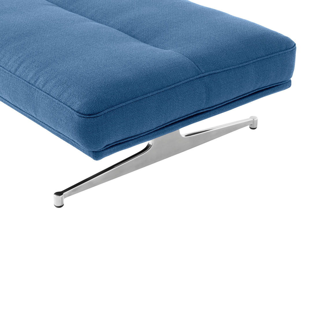 Blue padded cushion with a sleek silver metal base, featuring a modern, minimalist design.