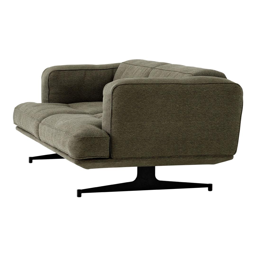 Olive green fabric couch with a smooth texture, featuring a minimalist design and sleek black metal base.