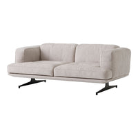 Light beige sofa with a smooth texture, featuring a minimalist design and sleek black metal legs.